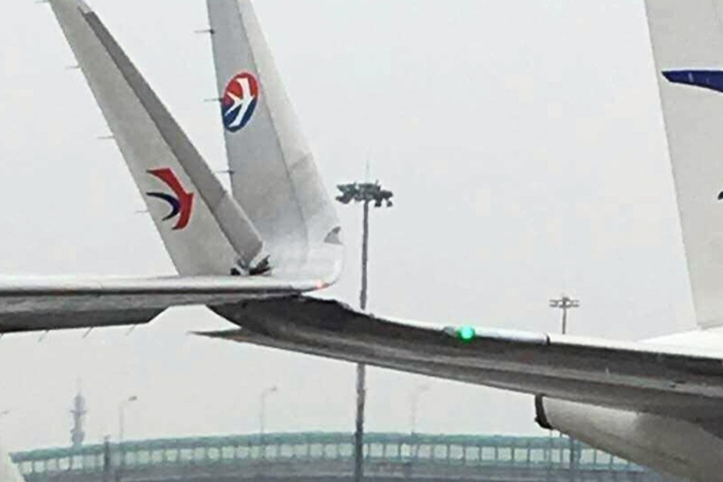 The two planes were involved in a minor collision at the Shanghai airport on Wednesday.