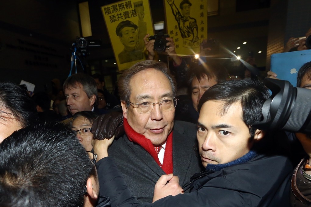 Chairman of the governing Council of the University of Hong Kong Arthur Li Kwok-cheung got surrounded by Hong Kong University students at the The Hong Kong Jockey Club Building For Interdisciplinary Research on Sassoon Road in Pok Fu Lam. Li refused to talk to students. Photo: Sam Tsang