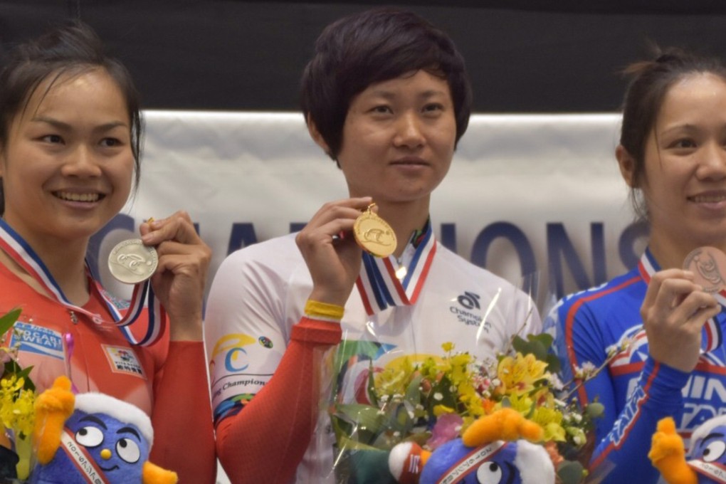 Sarah Lee Wai-sze (left) with her silver from the time trial in the Asian Championships. China’s Zhong Tianshi won the gold and Hsiao Mei-yu (right) of Taiwan took bronze. Photo: SCMP Pictures