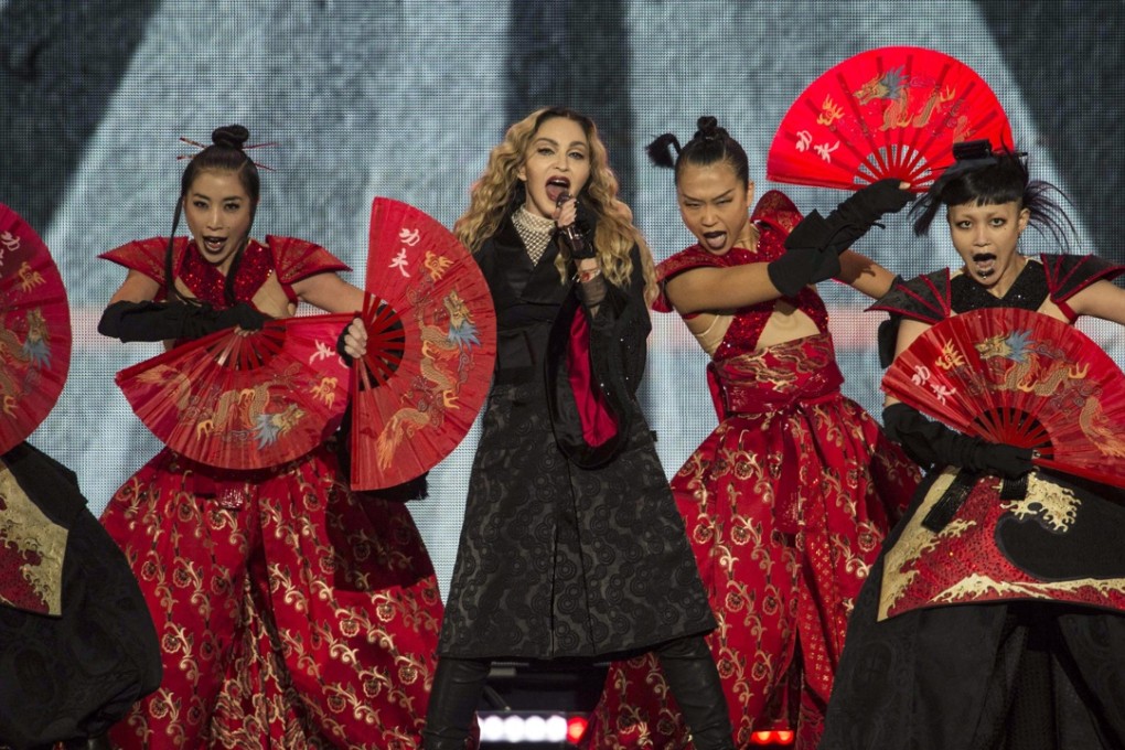 Madonna performing with dancers in Mexico City on her current tour. Photo: AP