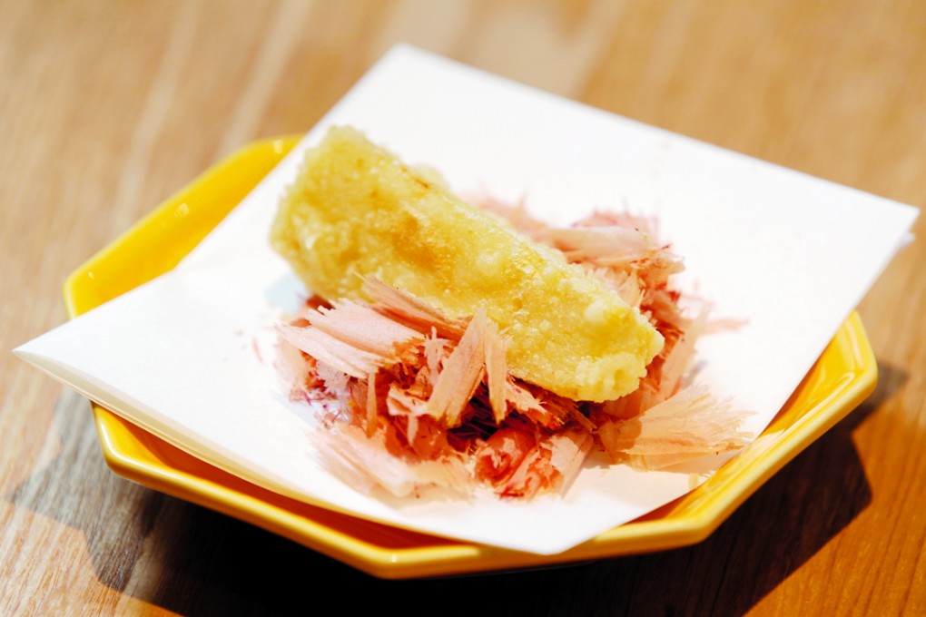 Tempura bamboo shoot with freshly shaved dried skipjack tuna at Tenkai. Photos: Bruce Yan