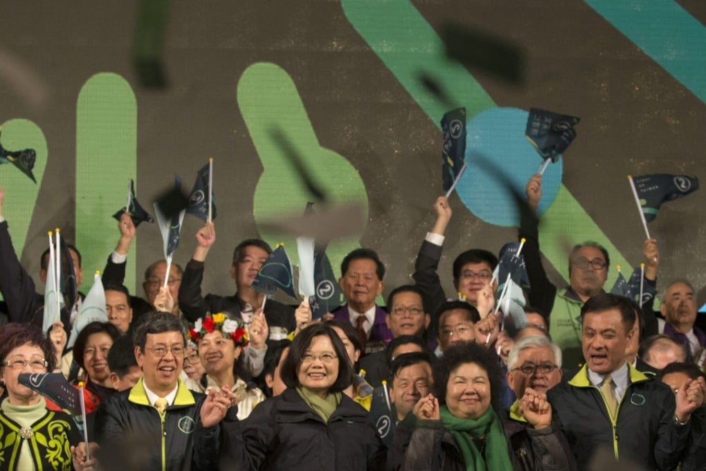 Tsai Ing-wen (centre), Taiwan's Democratic Progressive Party presidential candidate, celebrates her victory alongside party members in Taipei on January 16. Photo: AP