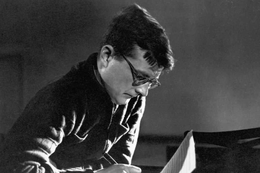 Dmitri Shostakovich at work. The Soviet composer is the subject of Julian Barnes’ new novel. Photo: Corbis