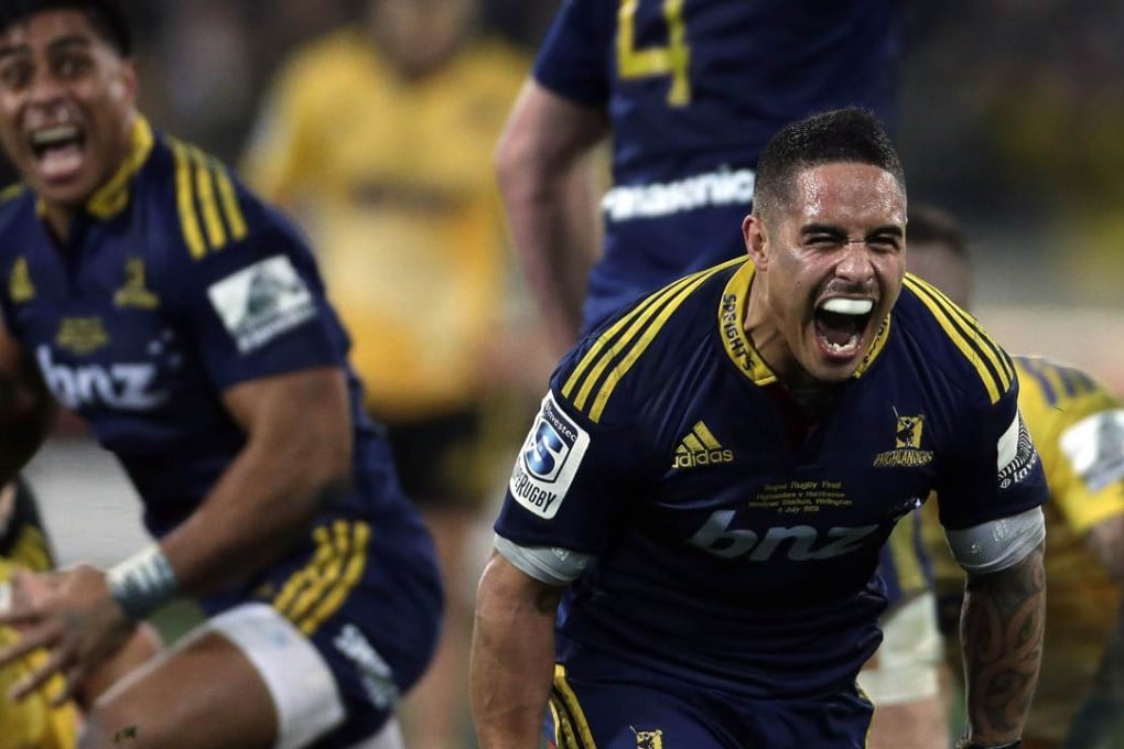 Highlanders Malakai Fekitoa and Aaron Smith celebrate winning the 2015 Super Rugby final against the Wellington Hurricanes. Photo: AFP