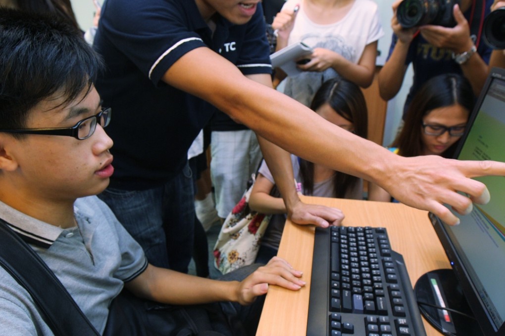 Students search for a course online at the Hong Kong Institute of Vocational Education campus in Wan Chai. Photo: Dickson Lee