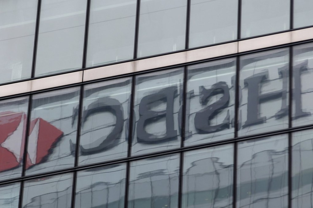 The HSBC headquarters is seen reflected in a neighbouring building in the Canary Wharf financial district in east London as the banking giant said on Friday its personal banking websites in the UK have been suspended after a cyber attack, its second major service outage this month. Photo: Reuters