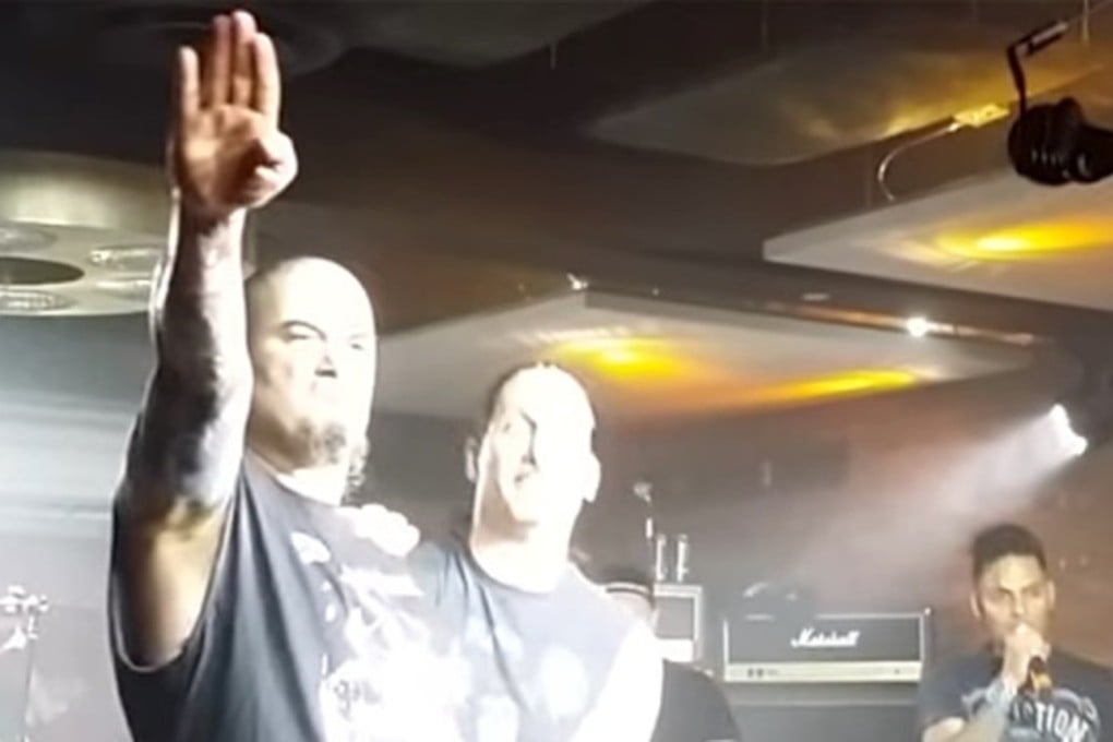 Phil Anselmo raises his arm in salute at a January 22 concert in Los Angeles. Photo: YouTube/Chris R