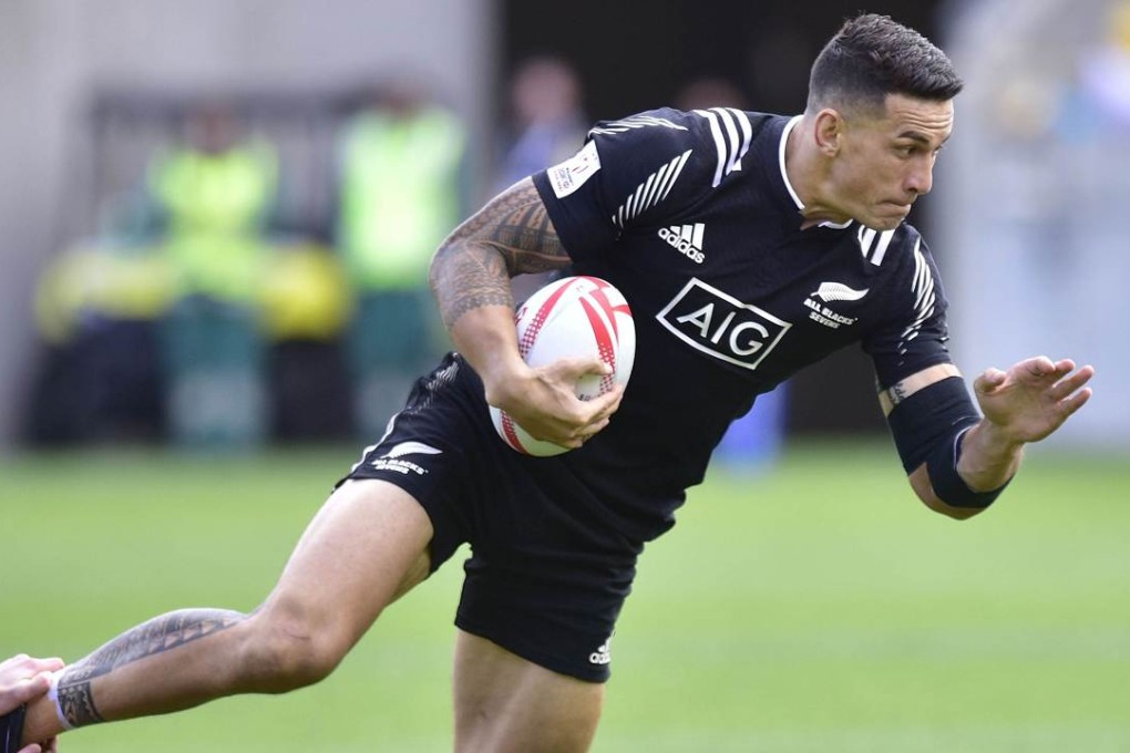 New Zealand's Sonny Bill Williams is tackled by Scotland's Scott Wight on the first day of the Wellington Sevens at Westpac Stadium. Photo: AFP