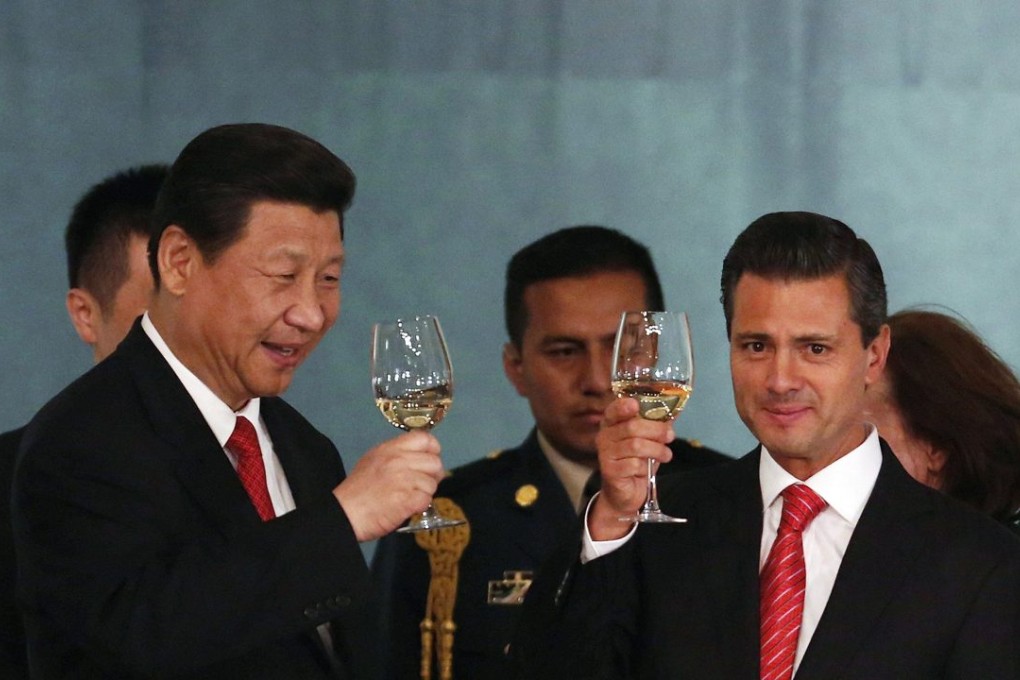 In this file photo, Chinese President Xi Jinping and his Mexican counterpart Enrique Pena Nieto toast at the National Palace in Mexico City on June 4, 2013. Photo: Reuters