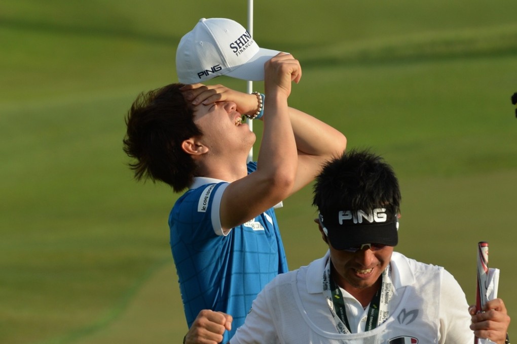 Song Young-han held his nerve to take the Singapore Open on a delayed final day. Photo: Xinhua