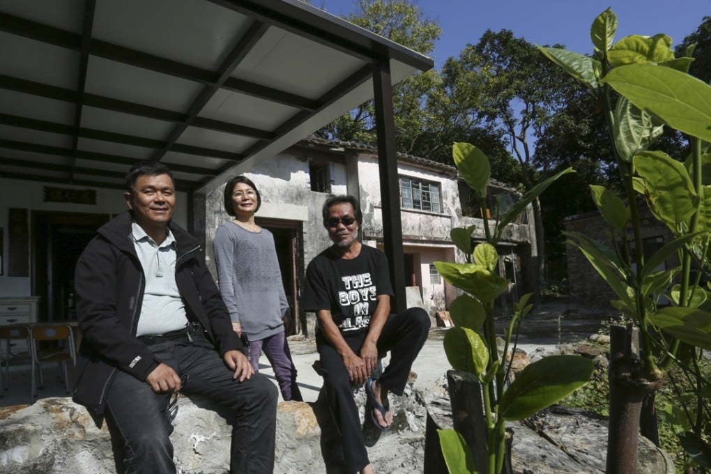 Village head Colin Chan Chung-tin, left, ecotourism operator Sue Chan Sze-tai, and heritage centre helper Yuen Wan-ying, in Yim Tin Tsai. Photo: Jonathan Wong