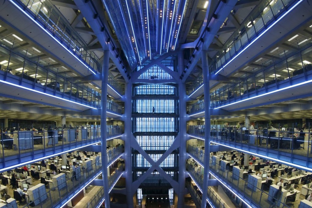 A fisheye view inside the HSBC headquarters in Hong Kong as the banking giant sent an email to staff on a freeze in both hiring and salaries for 2016 in its drive to cut costs by the end of 2017. Photo: Reuters