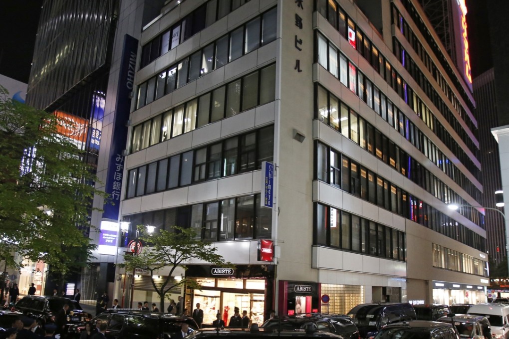 A building in Japan’s Ginza district as Tokyo begins accepting applications from residents to rent out their places. Photo: AP