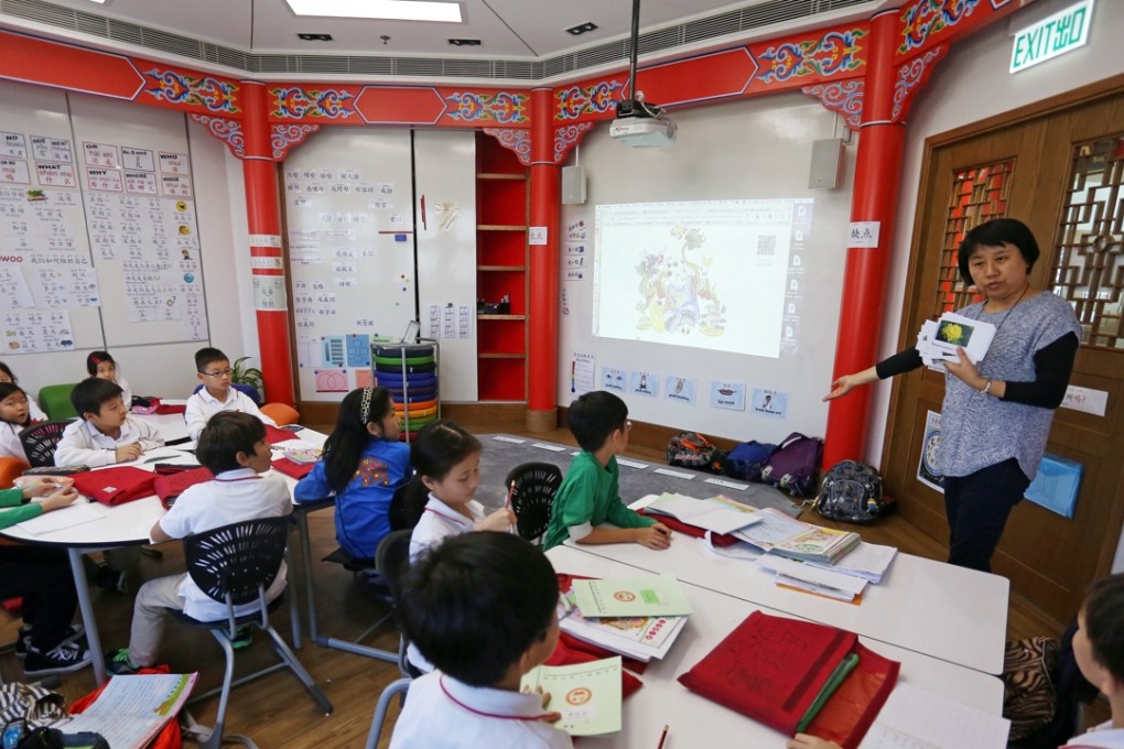Guo Lili teaches a class in the Chinese Cultural Centre at the Canadian International School. Photos: Jonathan Wong