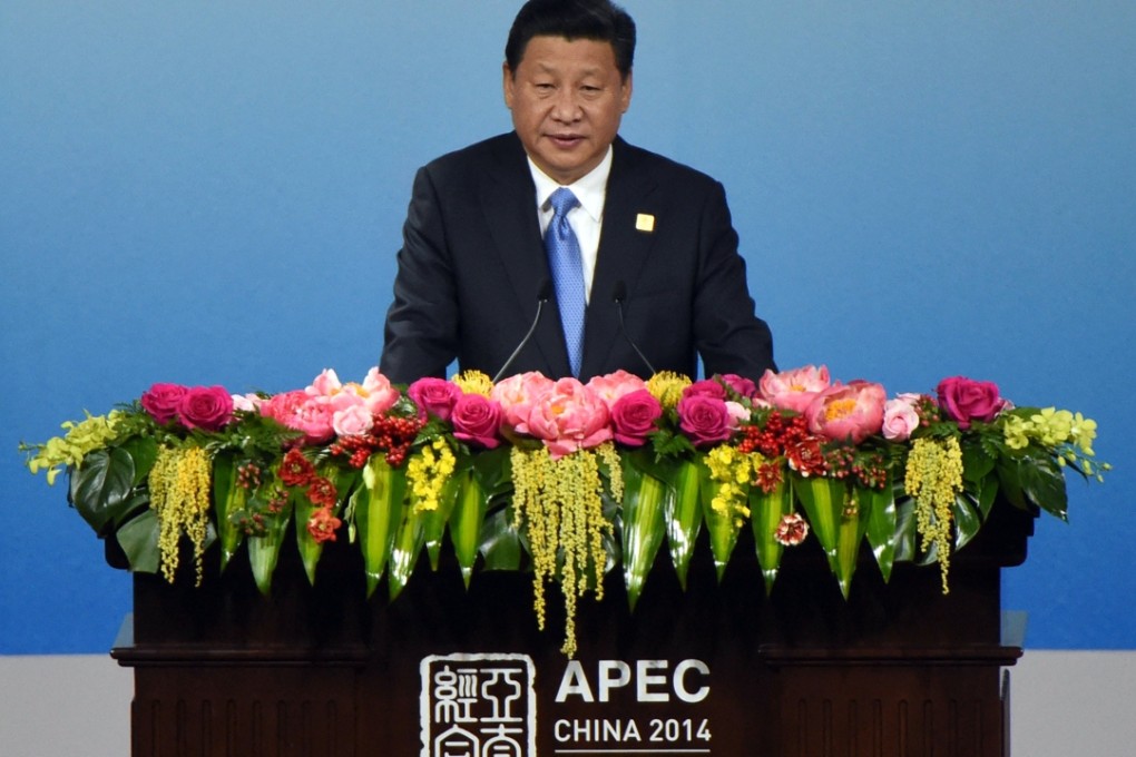 President Xi Jinping elaborated on China’s transition to an economic “new normal” at the APEC summit in Beijing in 2014. Photo: AP
