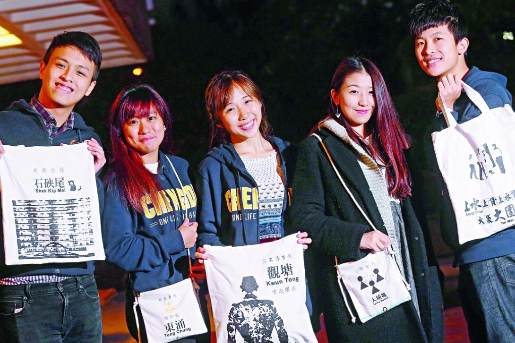 Polytechnic University students (from left) Terry Ho Leong-wai, Kasey Kwan Sin-yi, Sun Yi-chung, Siu Yuen-yan and Kenneth Yeung display their bags poking fun at the MTR, which will be on sale at this year’s fair. Photo: K. Y. Cheng