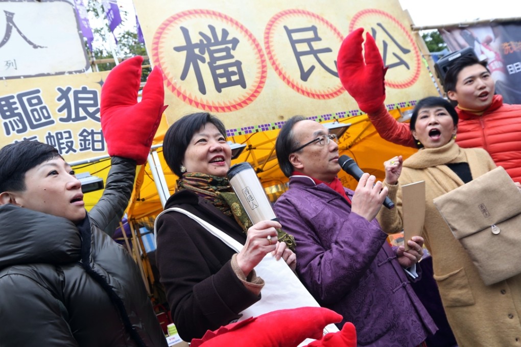 (From left to right) Tanya Chan, Audrey Eu Yuet-mee, Alan Leong Kah-kit and Claudia Mo Man-ching of the Civic Party launch their booth on the first day of the Lunar New Year fair at Victoria Park. Photo: Nora Tam