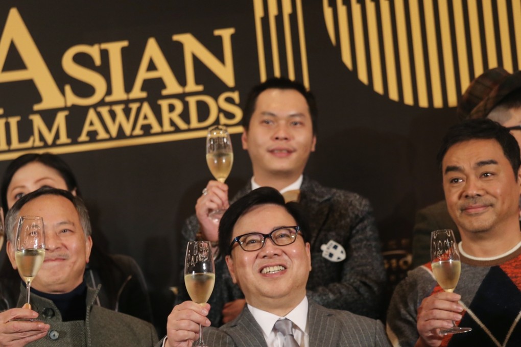 (Front, from left) Johnnie To, jury president of the Asian Film Awards, Wilfred Wong, and celebrity juror Sean Lau Ching-wan. Photo: David Wong