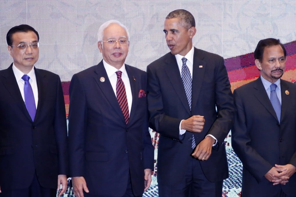 US President Barack Obama speaks to Malaysian Prime Minister Najib Razak flanked by China’s Premier Li Keqiang, left, and Brunei's Sultan Hassanal Bolkiah during November’s Asean Summit in Kuala Lumpur. Obama’s office earlier dubbed this month’s meeting at Sunnylands, the first hosted by a US president with the 10 Asean leaders, “unprecedented” and said it would further his aim of rebalancing US foreign policy towards Asia. Photo: AP