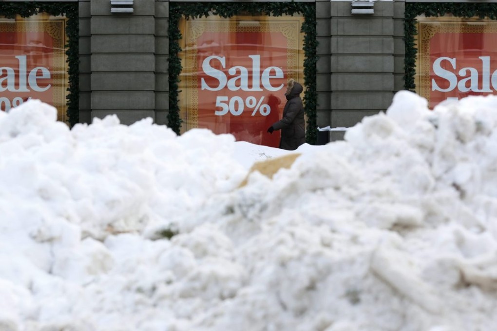 A poster advertises a sale in a department store in Moscow. Russia’s economic difficulties have spurred it to streamline procedures for trade. Photo: EPA