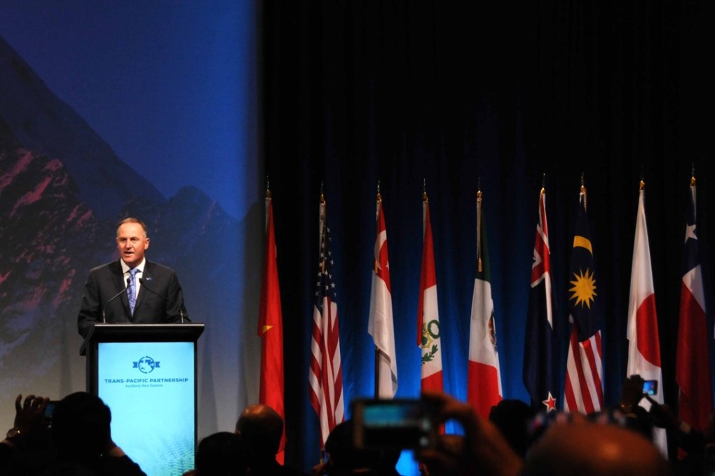 New Zealand Prime Minister John Key addresses officials from the 12 signatory nations in Auckland on Thursday. Photo: Xinhua