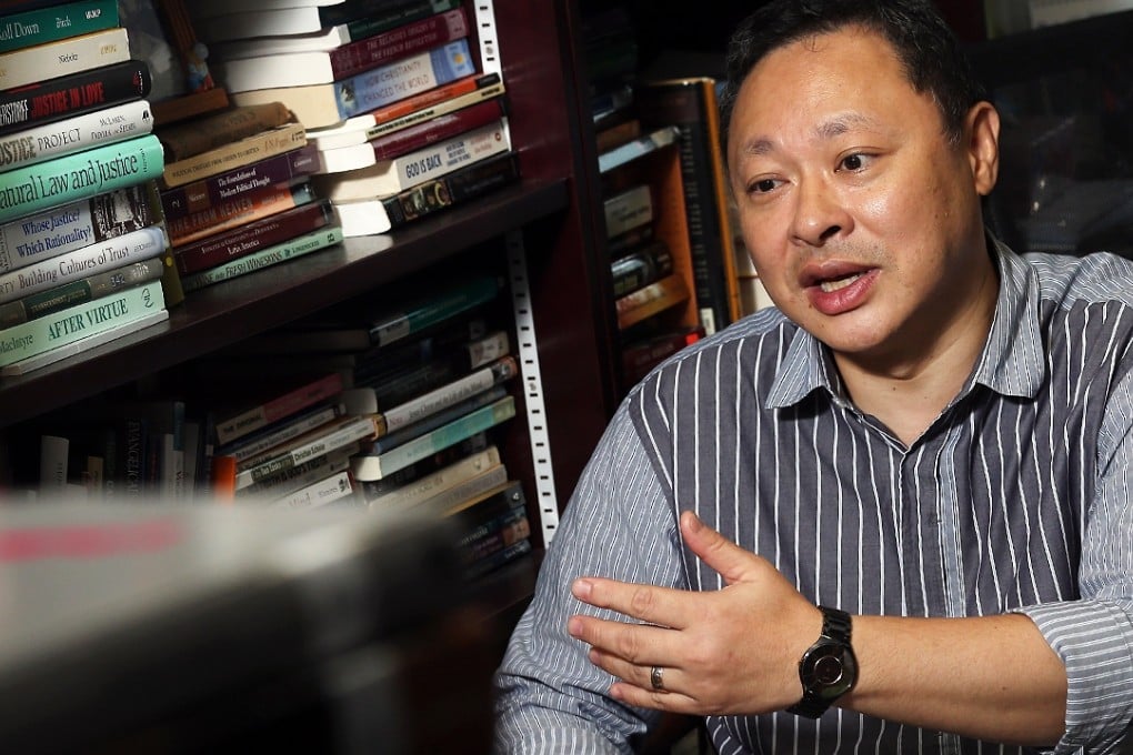 Benny Tai comes up with a plan to maximise the number of seats the pan-democratic camp can win in the Legco poll. Photo: K.Y. Cheng