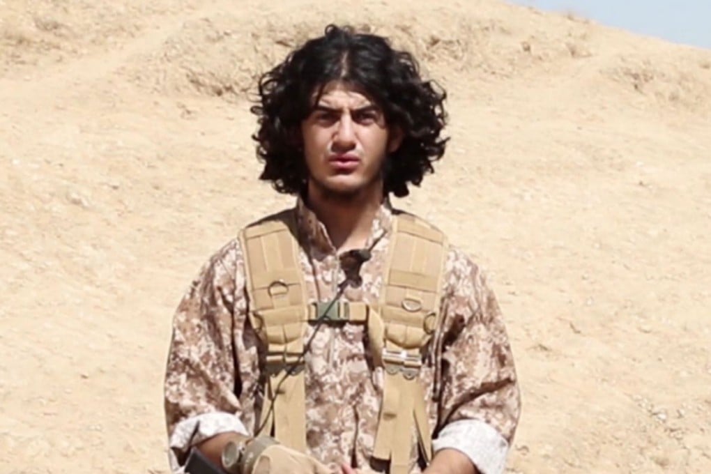 An image taken from a video shows an Islamic State member known by his nom de guerre Ukashah al-Iraqi. He is purported by IS to have been among nine jihadists involved in the November Paris attacks that killed 130 people. Photo: AFP