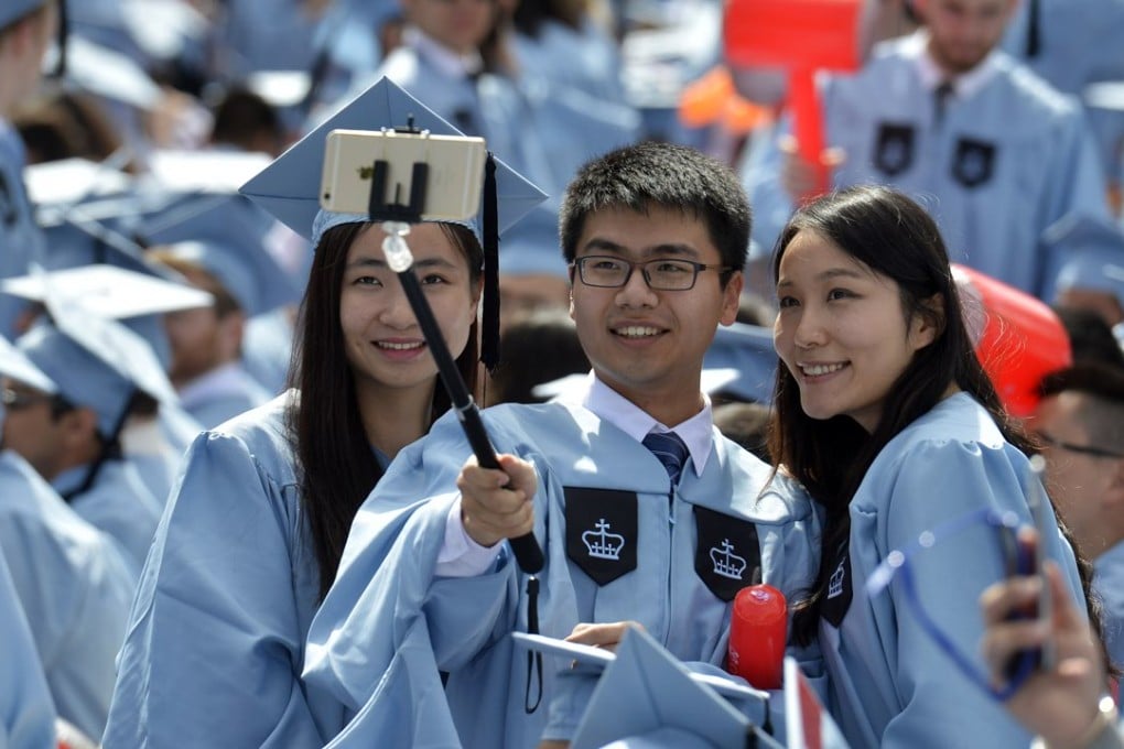 Chinese graduates of Columbia University attend a commencement ceremony in New York. Photo: Xinhua