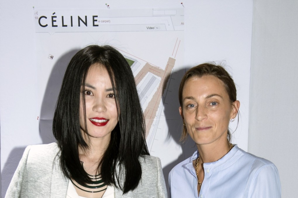 Phoebe Philo with Chinese actress and singer Faye Wong at a Celine show in Beijing in 2014.