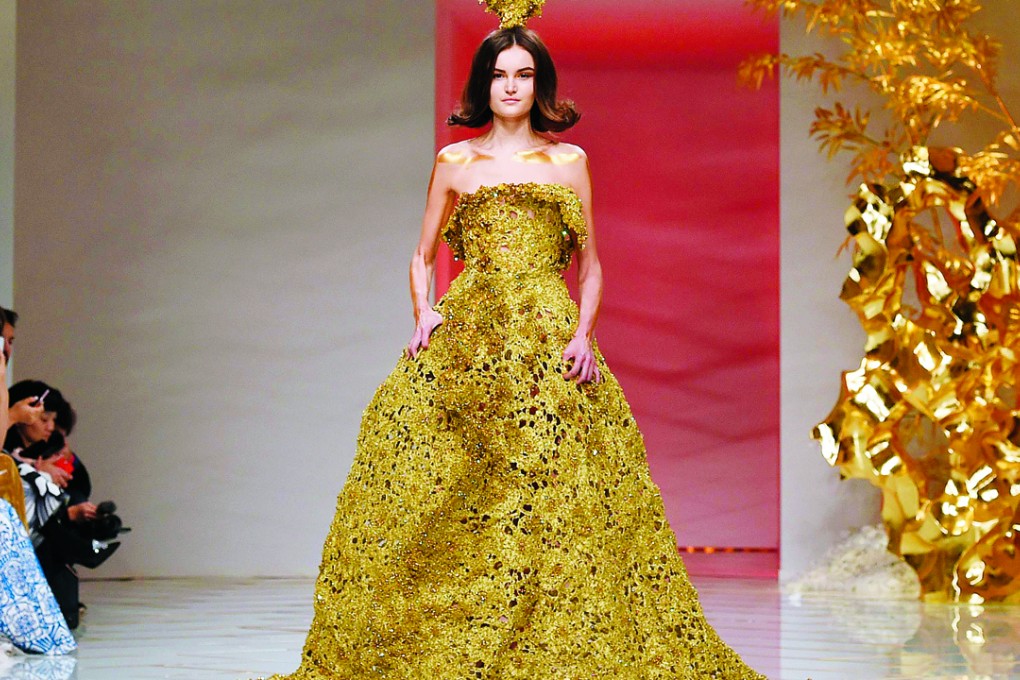 A model presents a creation from Chinese designer Guo Pei’s 2016 spring/summer haute couture collection in Paris. Photo: AFP