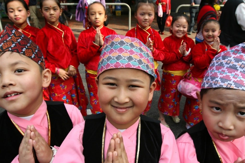 Nepalese children attend a cultural event in Yuen Long. They may face a hard life. Photo: Felix Wong