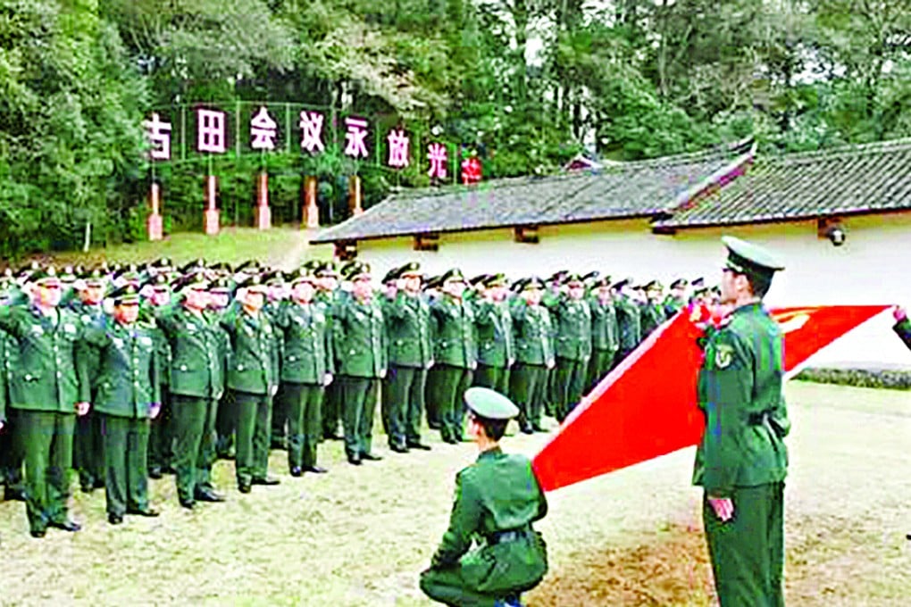 Officers from the Eastern Command salute the flag in Gutian in Fujian province on Wednesday. Photo: SCMP Pictures