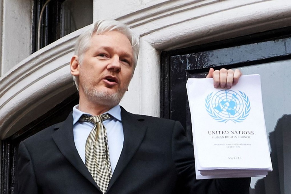 WikiLeaks founder Julian Assange addresses the media from the balcony of the Ecuadorian embassy. Photo: AFP