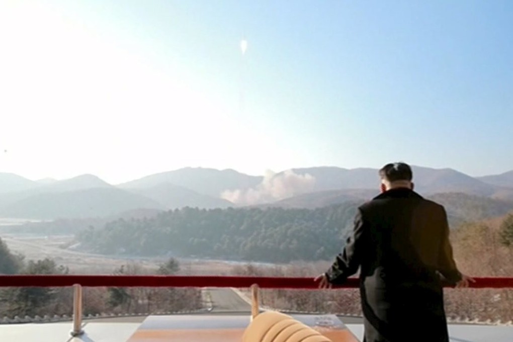 North Korean leader Kim Jong-un watches a long range rocket launched into the air in this unverified still image taken from KRT footage and released by Yonhap on February 7, 2016. Photo: Reuters