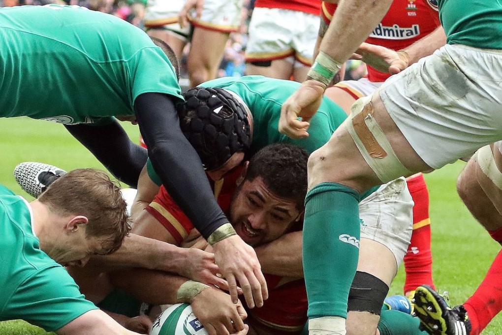 Wales number eight Taulupe Faletau finds a way through the Irish defence to score at Aviva Stadium in Dublin. Photo: AFP