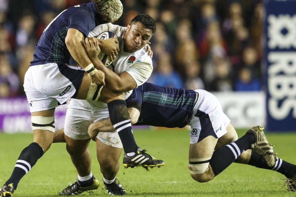 England's Billy Vunipola proves a handful for the Scotland defence during the 15-9 victory at Murrayfield. Photo: EPA