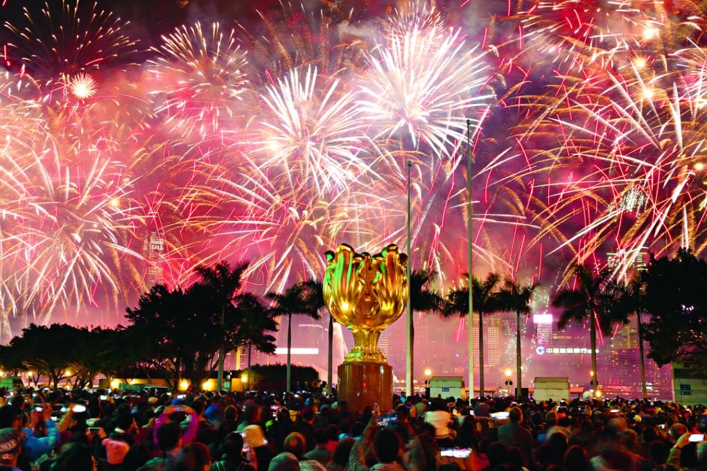 Fireworks over Victoria Harbour to celebrate the Lunar New Year on Tuesday. Photo: David Wong