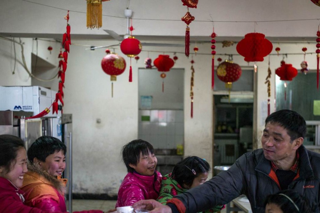 Chinese children in an orphanage celebrate the Lunar New Year, the most important holiday on the Chinese calendar. Photo: AFP