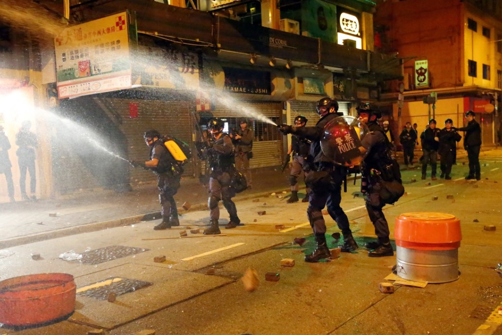 Police confronted rioters in Mong Kok overnight from Monday evening to Tuesday morning. Photo: Edward Wong