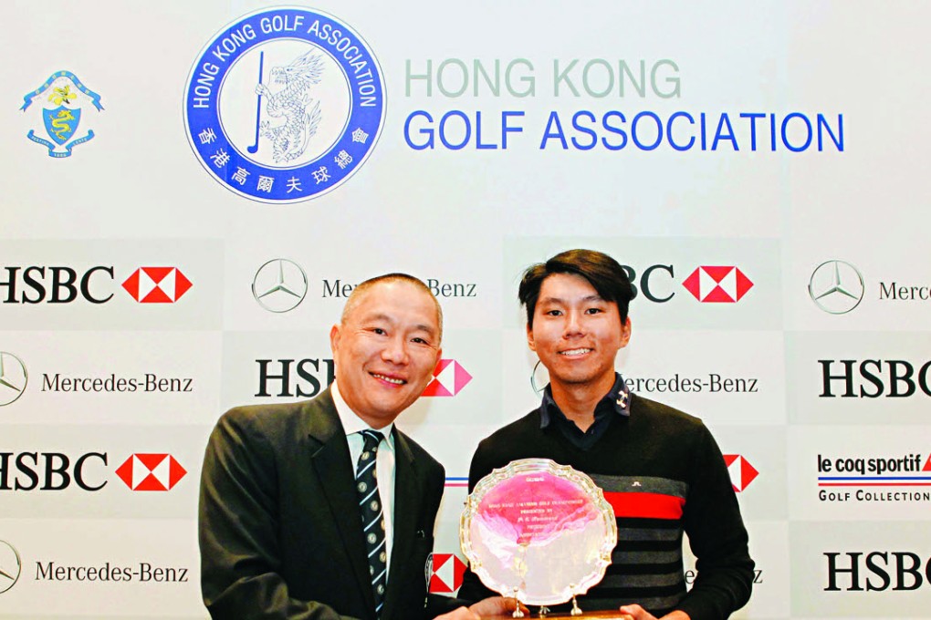 Terrence Ng receives his trophy from HKGA president Mark Chan. Photo: Daniel Wong