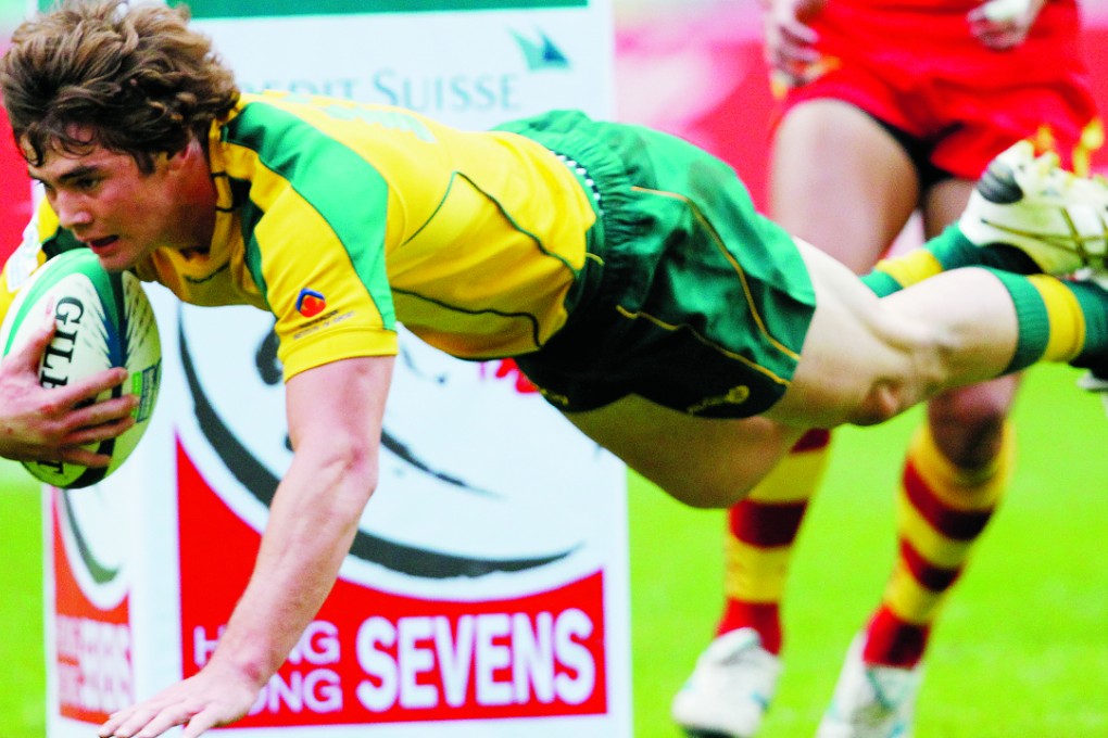 Liam Gill scoring for Australia against China in a pool match at the Hong Kong Sevens in 2010. Photo: Martin Chan/SCMP