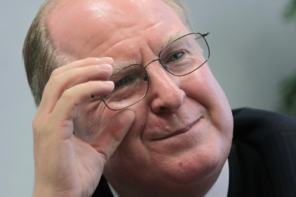 Manulife chief executive Donald Guloien said if the “mark-to-market” impact of lower energy prices on investments was excluded, core profit had risen 18.7 per cent for the full year. Photo: Bruce Yan