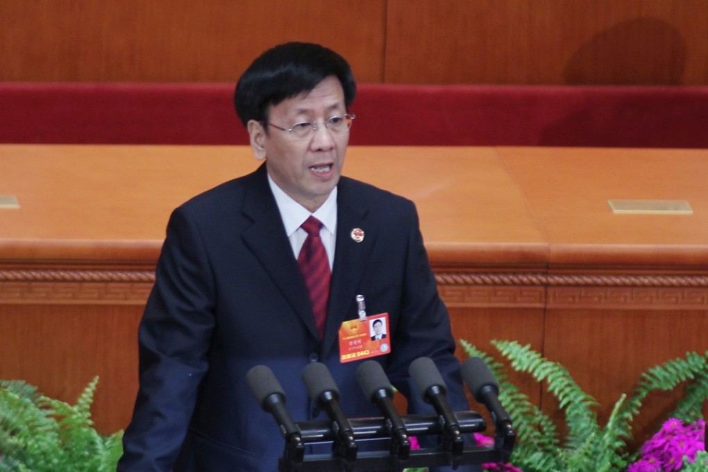 China's Procurator-General Cao Jianming delivers a report on the work of the Supreme People's Procuratorate at the National People's Congress in Beijing in 2013. Photo: Simon Song