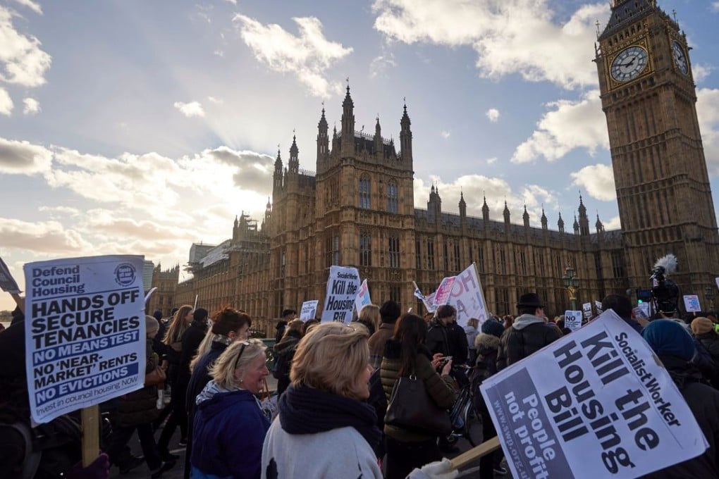 Demonstrators take part in a protest opposing the British government's Housing and Planning Bill, in central London. Photo: AFP