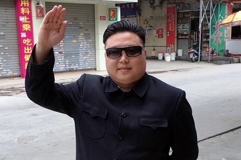 Zhang Daiming, aka the Guangzhou Kim Jong-un, wanders the streets of the great southern Chinese city. Photo: YCWB.com