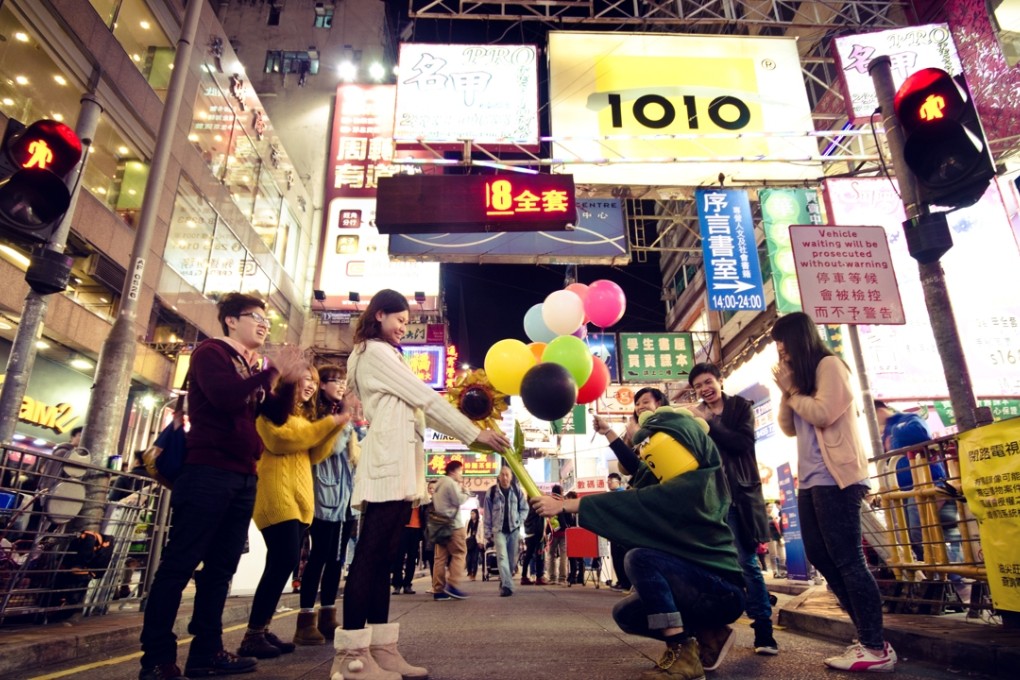 Costumed performers are a regular sight on the pedestrian zone of Sai Yeung Choi Street South. Photo: Kevin Cheng
