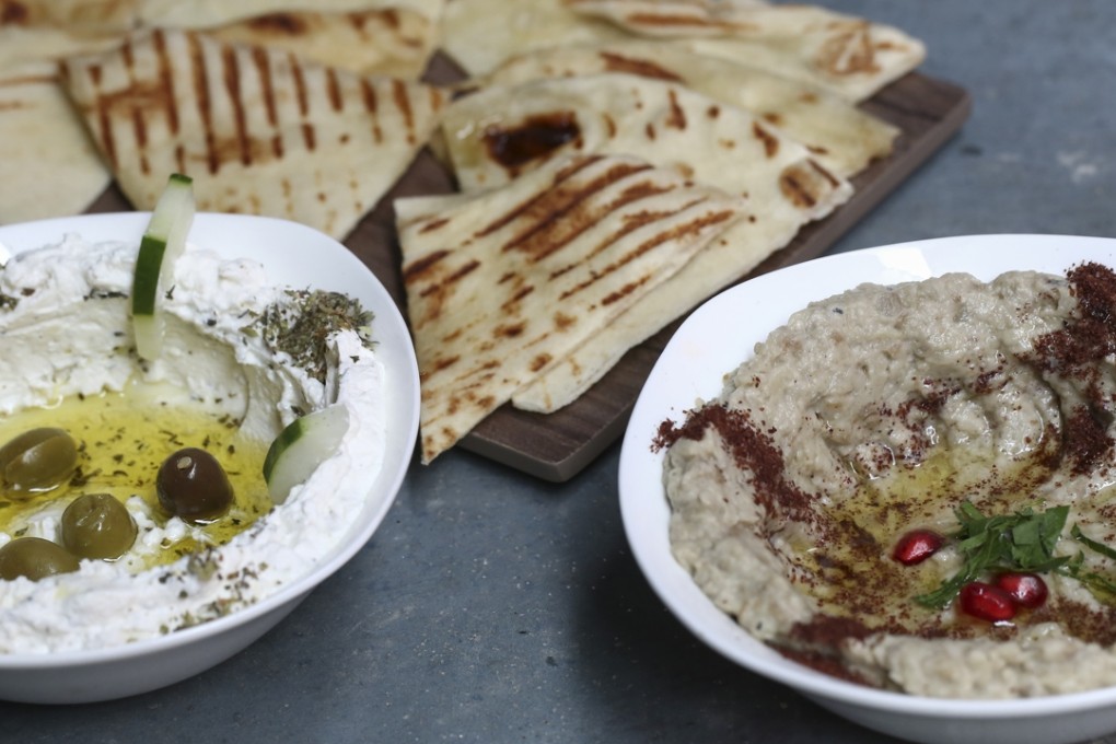 The dips are the standout fare at Atwar, including satsivi (above left) and bazenjan (also known as baba ganoush). Photos: Jonathan Wong