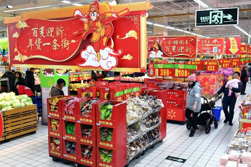 Nanjing residents shop for groceries at a supermarket ahead of the Lunar New Year. Photo: Xinhua