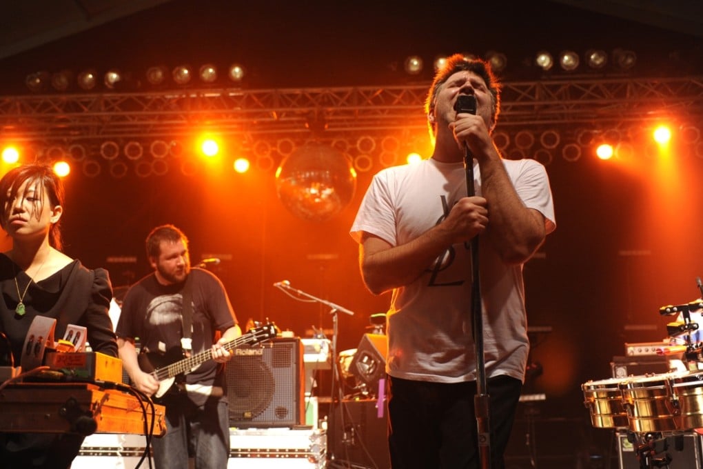 Nancy Whang, left, and James Murphy of LCD Soundsystem (in white T-shirt), performing in 2010. Photo: Corbis