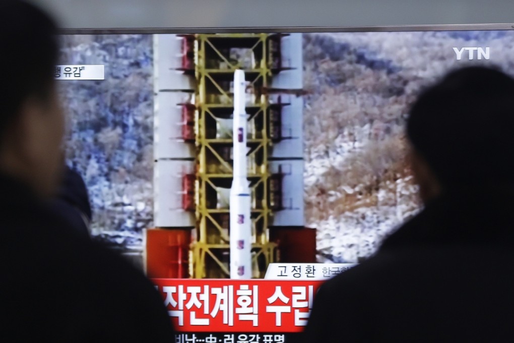 People watch a report of a rocket launch in North Korea at Seoul Railway Station in Seoul, South Korea, earlier this month. Photo: AP